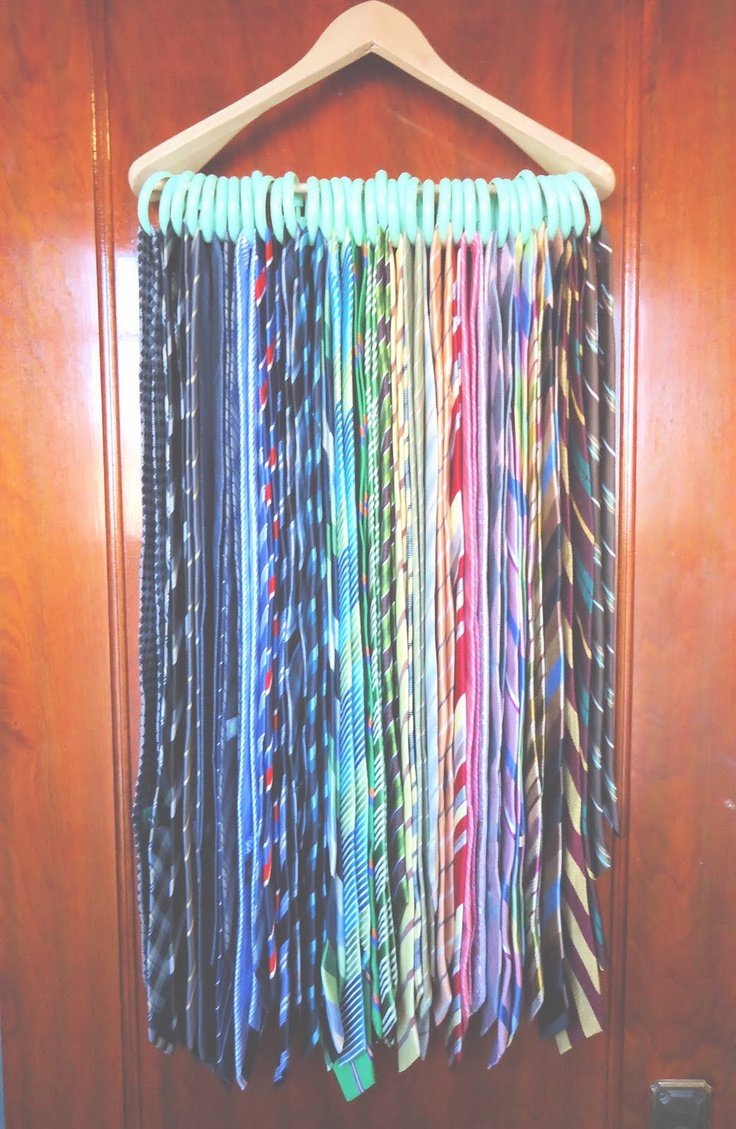 How to Organize Ties! Works for scarves and baseball hats too. Wooden hanger plus round shower curtain hooks.