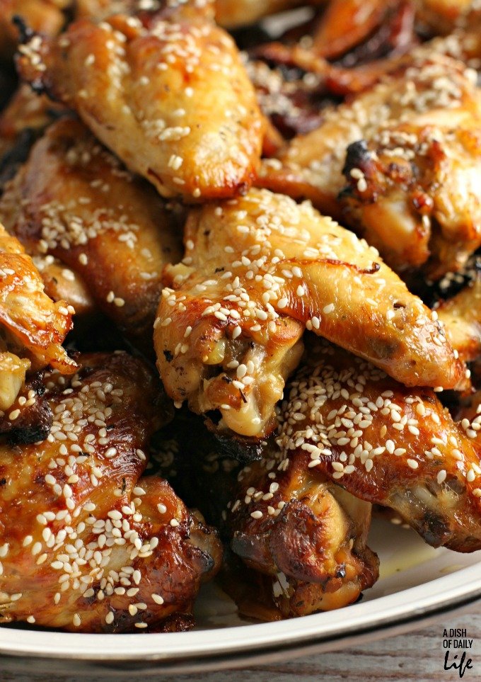 These Tangy Sesame Chicken Wings, with their Asian flair, are my go-to game day and party appetizer recipe! Everyone always raves about them, and they disappear quickly! YOU HAVE TO TRY THESE!