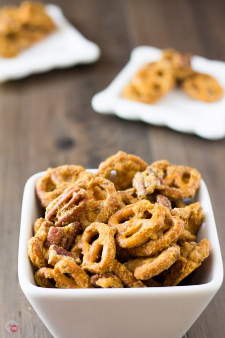 Step up your snack game with pretzels and pecans covered in a crispy caramel coating that is addicting! You will be asked back when you bring these crack pretzels as a hostess gift for sure! Crispy Caramel Crack Pretzels Recipe | Take Two Tapas