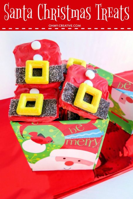 These Santa Suit Christmas Treats are perfect for holiday parties - tasty chocolate pretzel bites! | OHMY-CREATIVE.COM