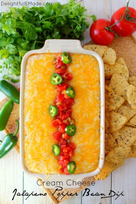 Jalapeno Popper Dip doesn't get much better than this! Made with Ro*Tel and Rosarita Refried Beans this hot cream cheese bean dip recipe is perfect for game day or anytime you want a delicious dip for snacking.